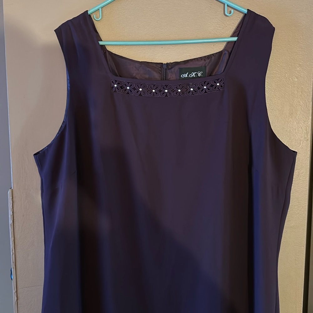 Two piece grape colored sleeveless dress with a jacket, never worn